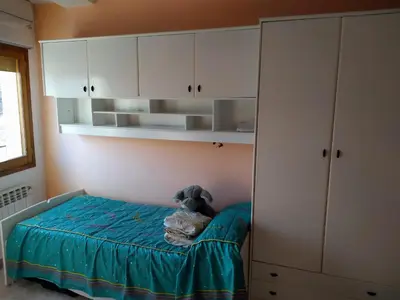 Cama o camas de una habitación en APARTAMENTO QUINTO