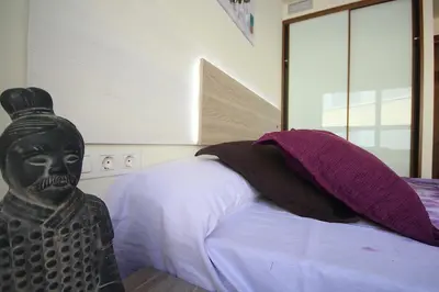 Cama o camas de una habitación en Romantic Loft