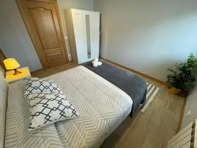 Cama o camas de una habitación en Apartamentos Montejurra