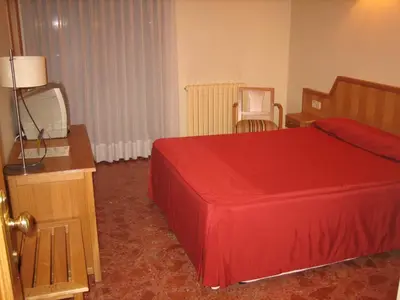 Cama o camas de una habitación en Hotel Chané