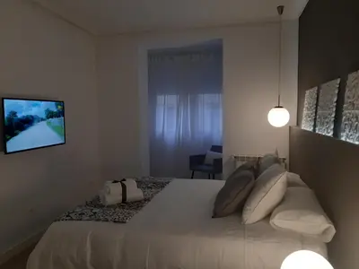 Cama o camas de una habitación en La parada de Conde Aranda