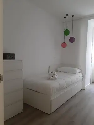Cama o camas de una habitación en La parada de Conde Aranda