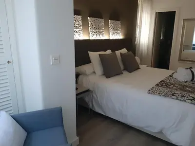 Cama o camas de una habitación en La parada de Conde Aranda