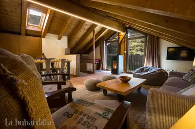 Zona de estar de Abadía de Montenartró Apartamentos