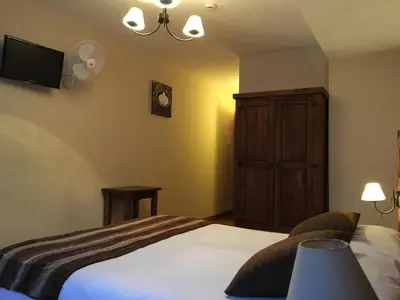 Cama o camas de una habitación en Hostal Otsoa