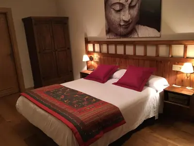 Cama o camas de una habitación en Hostal Otsoa