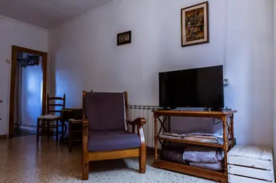 Una televisión o centro de entretenimiento en Casa Tato Figuerola d'Orcau