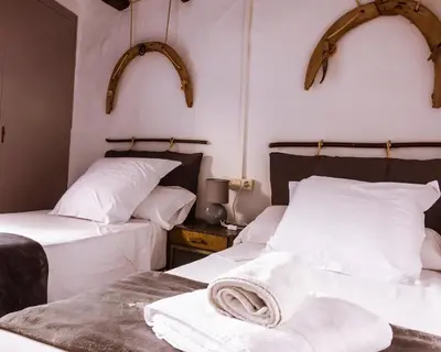Cama o camas de una habitación en Casa Tato Figuerola d'Orcau