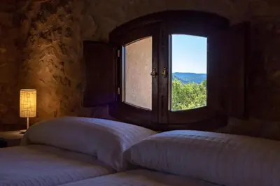 Cama o camas de una habitación en Masia Villa Pilar Valderrobres