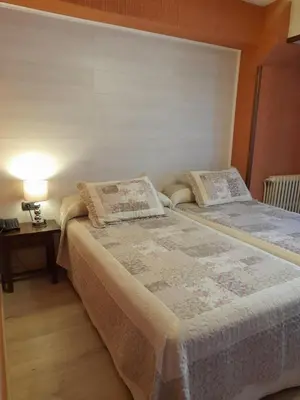 Cama o camas de una habitación en Hotel Giral