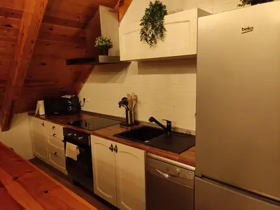 Una cocina o zona de cocina en Alojamientos Turísticos TURBON - Campo