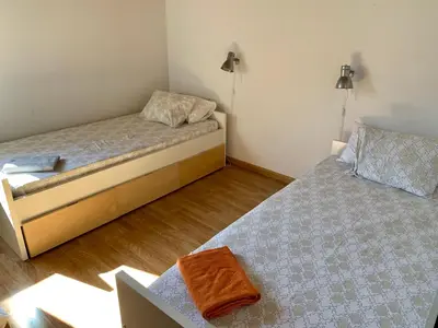 Cama o camas de una habitación en Casa Mya. A Modern Duplex in the Spanish Pyrenees