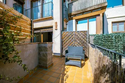 Un balcón o terraza de Apartamentos Vino Tinto y Restaurante Tomate Rosa