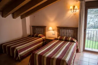 Cama o camas de una habitación en CASA BERNAT
