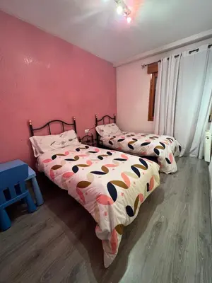 Cama o camas de una habitación en La Perla del Pirineo