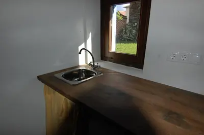 Una cocina o zona de cocina en Apartamento El Fenal de Turmo Casa rural 