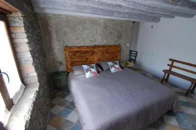 Cama o camas de una habitación en Apartamento El Fenal de Turmo Casa rural 