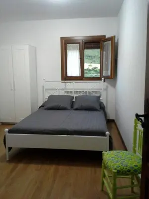 Cama o camas de una habitación en APARTAMENTO FONTELLAS-AYERBE