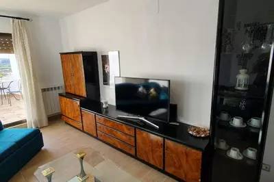 Una televisión o centro de entretenimiento en LA GATERA 1D BAJO ARAGON - MATARRAÑA