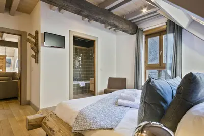 Cama o camas de una habitación en LUDERNA - Dúplex Pin Nere