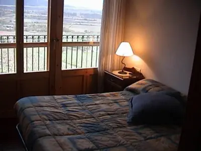 Cama o camas de una habitación en Tossal del Maig