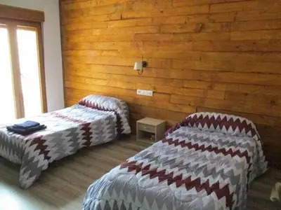 Cama o camas de una habitación en Casa Rural La Malena