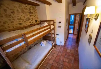 Cama o camas de una habitación en CAL PREMSET turisme rural Arnes