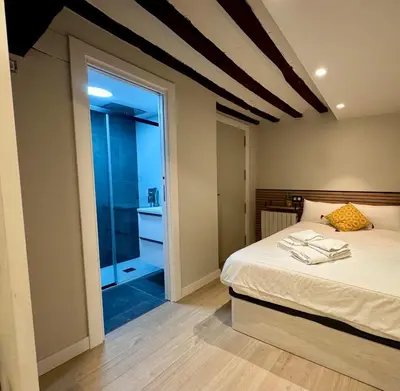 Cama o camas de una habitación en El Oasis de la Estafeta