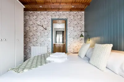 Cama o camas de una habitación en Luderna - Apartamento Cap de Aran A3