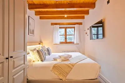 Cama o camas de una habitación en Luderna - Apartamento con jardín Pleta de Arties Montardo