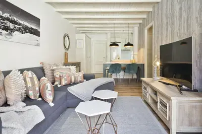Una televisión o centro de entretenimiento en Luderna - Apartamento Mirador de Aran