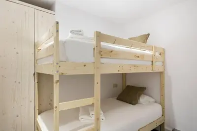 Cama o camas de una habitación en Luderna - Apartamento Mirador de Saumet