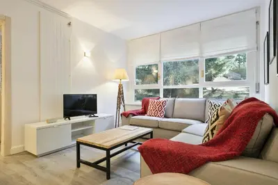 Una televisión o centro de entretenimiento en Luderna - Apartamento Mirador de Saumet