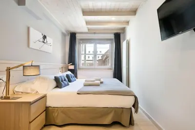 Cama o camas de una habitación en Luderna - Apartamento Val de Ruda A24 de Ribereta