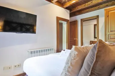 Cama o camas de una habitación en Luderna - Apartamento Val de Ruda B21 Blanhiblar