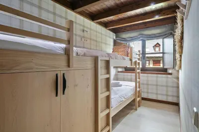 Cama o camas de una habitación en Luderna - Apartamento Val de Ruda B3 Entecada