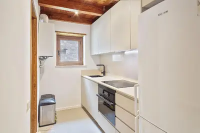 Una cocina o zona de cocina en Luderna - Casa con jardín Vista Aneto
