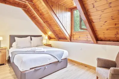 Cama o camas de una habitación en Luderna - Casa con jardín Vista Aneto