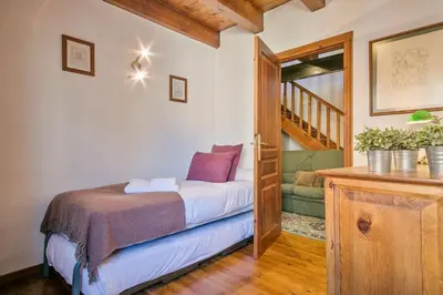 Cama o camas de una habitación en Luderna - Casa Coto Moreu