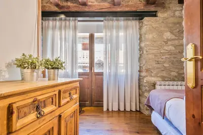Cama o camas de una habitación en Luderna - Casa Coto Moreu