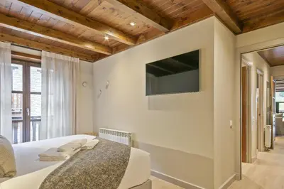 Una televisión o centro de entretenimiento en Luderna - Dúplex Val de Ruda C1 de Carlac
