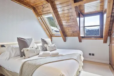 Cama o camas de una habitación en Luderna - Dúplex Val de Ruda C12 Tuc der Òme
