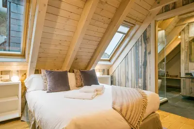 Cama o camas de una habitación en Luderna - Tríplex Tuc dera Salana