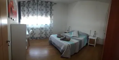Cama o camas de una habitación en El Descanso