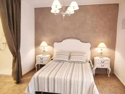 Cama o camas de una habitación en Casa Rural els Esclopets