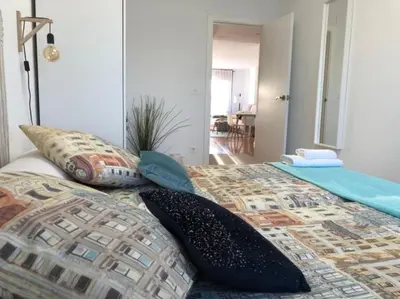 Cama o camas de una habitación en Apartamento Turístico El Enclave