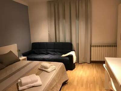 Cama o camas de una habitación en Hostal Casiano Camarasa