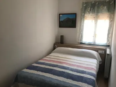 Cama o camas de una habitación en Hostal Casiano Camarasa