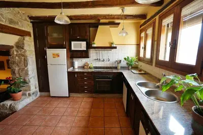 Una cocina o zona de cocina en Casa rural con mucho encanto, en un entorno mágico