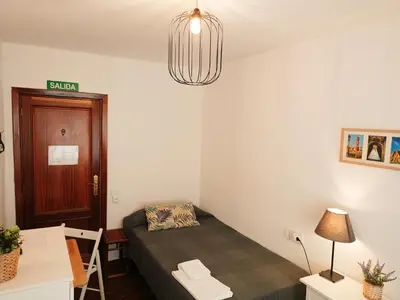 Cama o camas de una habitación en Pensión las Hojas